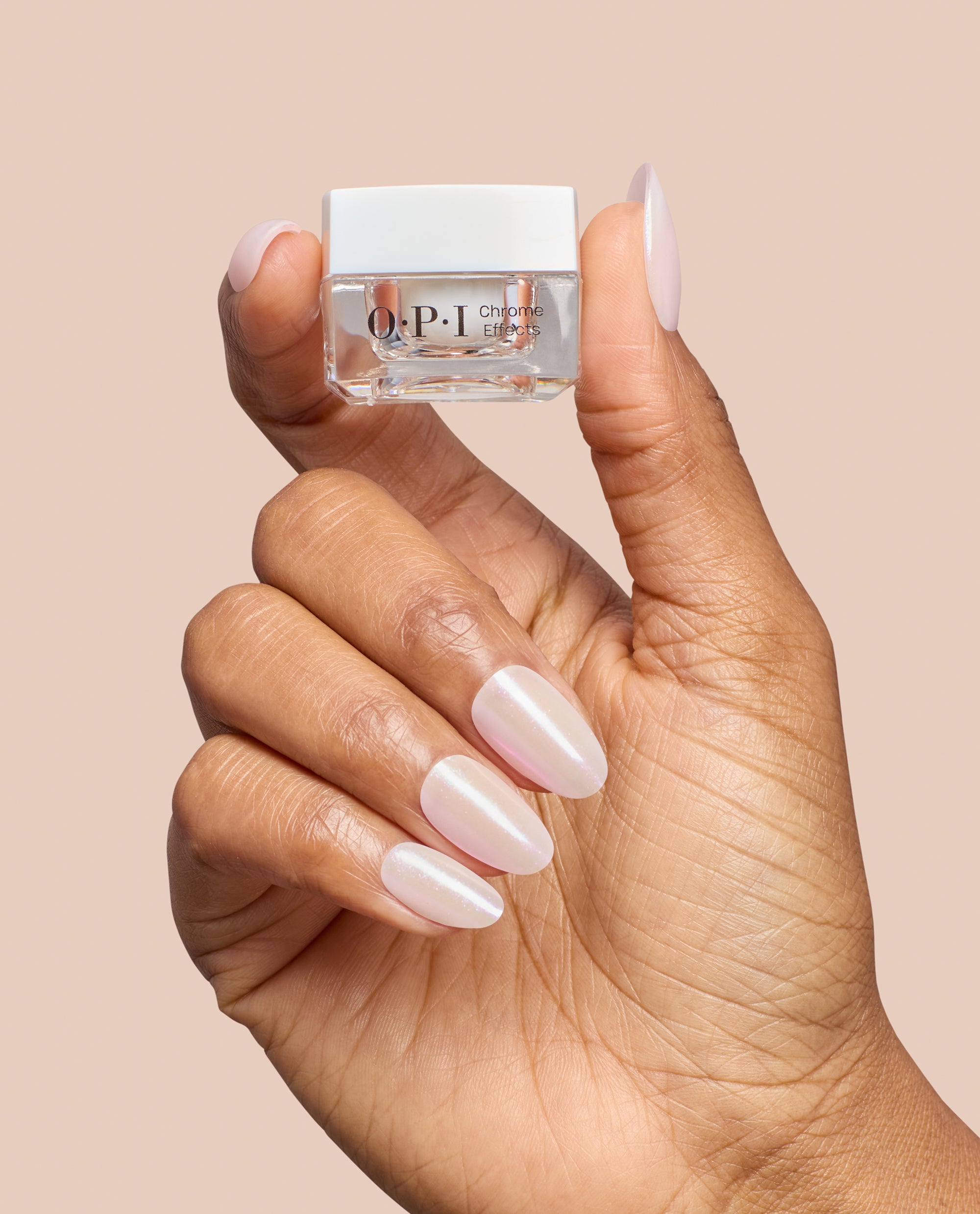 CP26_ecommerce_jpg_pearl_pressure_over_baby_take_a_vow_cp011_chrome_powder_99350192107_hand_and_bottle_13daae45-d412-4833-bc01-9d2d488d2d87.jpg