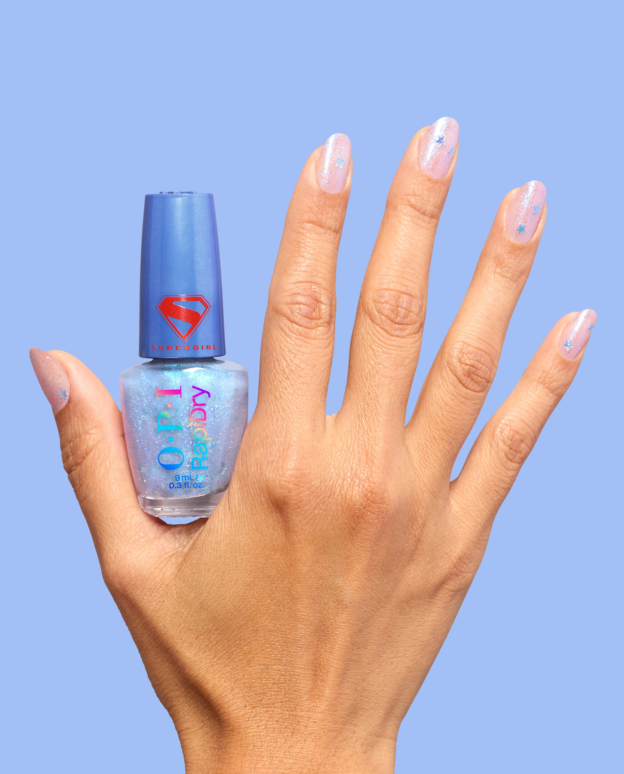 cosmic_chic_rd0041_rapid_dry_99350196012_hand_and_bottle.jpg