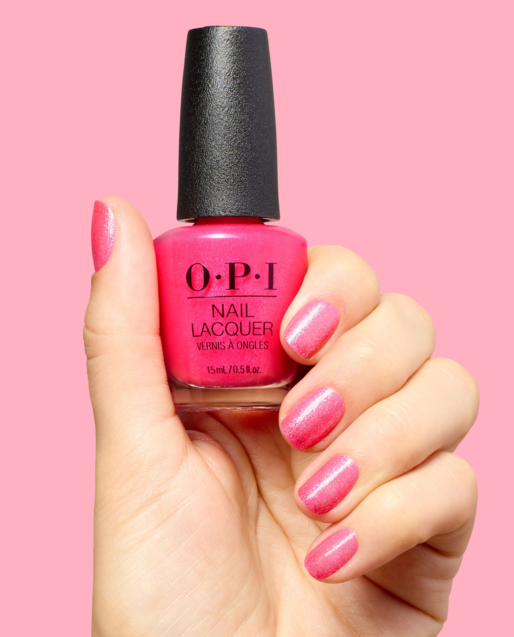 dopa-mani_nls081_nail_lacquer_99350191338_hand_and_bottle_13db5d73-3439-4a2a-85ec-79f725fb301b.jpg