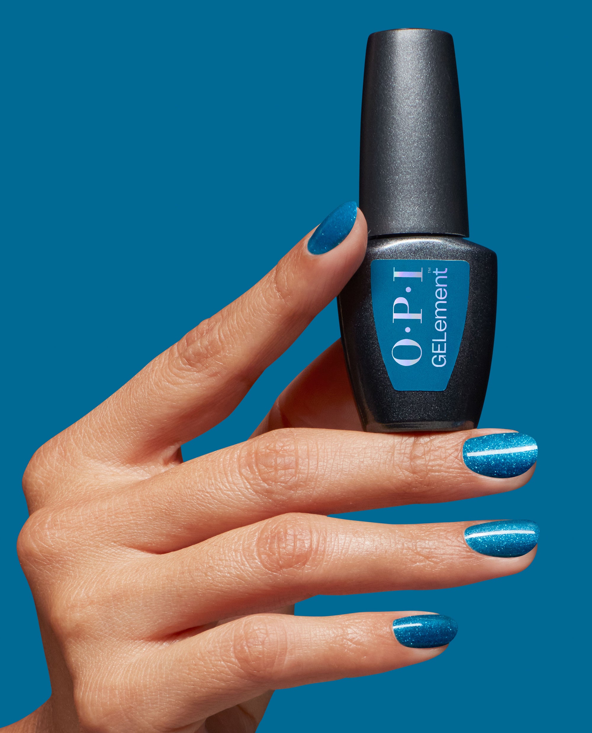 i_sea_you_ge0030_OPI-Nail-Enhancements-Gels_99399001435_hand_and_bottle_3625d601-e400-48e1-ab97-b7f23ef2219b.jpg